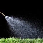 Watering The Grass at night